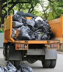 garbage-truck-with-loading-waste-park-garden_38678-2947